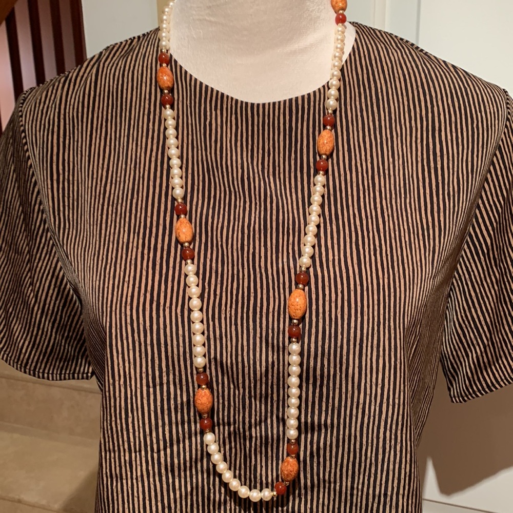 MAGGIE‎ SWEET. Brown/Black striped shirt. Short sleeves.